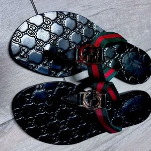 Gucci web flip flops